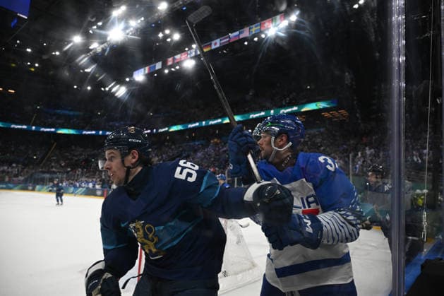 Ice hockey, Eishockey - Milano Cortina 2026 Winter Olympics: Day 8 Erik Haula (FIN) and Phil Pietroniro (ITA) participate in the Winter Olympic Games, Olympische Spiele, Olympia, OS at the Milano Santagiulia IHO Arena in Milano, Italy, on February 14, 2026. Milano Lombardia Italy  Copyright: xFedericoxManonix originalFilename:manoni-olympics260214_npqXJ.jpg