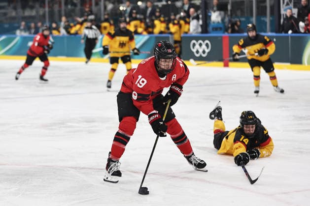 Brianne Jenner, CAN (back: Carina Strobel, GER), during preliminaries (CAN - GER) at 2026 Ice hockey, Eishockey Olympic Games, Olympische Spiele, Olympia, OS in Milan; 14 02 2026 - *** Brianne Jenner, CAN back Carina Strobel, GER , during preliminaries CAN GER at 2026 ice hockey olympic games in Milan 14 02 2026 