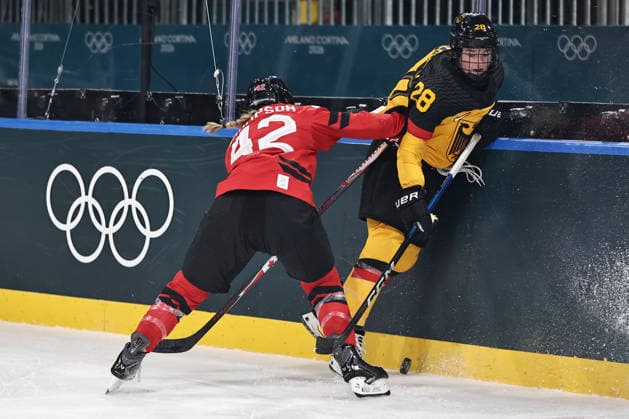 Claire Thompson, CAN, and Kristina Jobst-Smith, GER, during preliminaries (CAN - GER) at 2026 Ice hockey, Eishockey Olympic Games, Olympische Spiele, Olympia, OS in Milan; 14 02 2026 - *** Claire Thompson, CAN, and Kristina Jobst Smith, GER, during preliminaries CAN GER at 2026 ice hockey olympic games in Milan 14 02 2026 