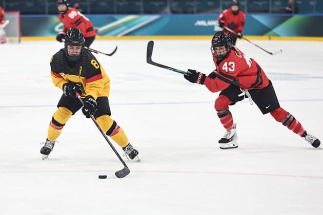 Ronja Hark, GER, and Kristin O Neill, CAN, during preliminaries (CAN - GER) at 2026 Ice hockey, Eishockey Olympic Games, Olympische Spiele, Olympia, OS in Milan; 14 02 2026 - *** Ronja Hark, GER, and Kristin O Neill, CAN, during preliminaries CAN GER at 2026 ice hockey olympic games in Milan 14 02 2026 
