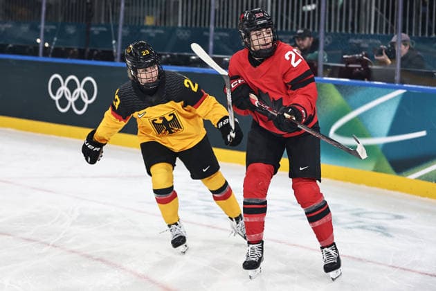 Lilli Welcke, GER, and Sarah Nurse, CAN, during preliminaries (CAN - GER) at 2026 Ice hockey, Eishockey Olympic Games, Olympische Spiele, Olympia, OS in Milan; 14 02 2026 - *** Lilli Welcke, GER, and Sarah Nurse, CAN, during preliminaries CAN GER at 2026 ice hockey olympic games in Milan 14 02 2026 