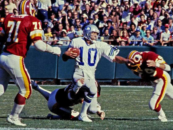 Sept. 28, 1980 - Washington, District of Columbia, United States of America - Seattle Seahawks quarterback Jim Zorn (10) is tackled as he carries the ball against the Washington Redskins at RFK Stadium in Washington, DC on September 28, 1980. The Seahawks won the game 14 - 0. Pictured are Washington Redskins left defensive end Karl Lorch (71) and left linebacker Brad Dusek (59)...Credit: Arnie Sachs CNP Copyright: xArniexSachsx