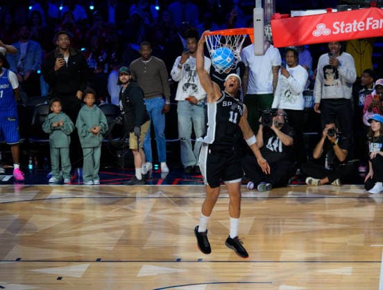 NBA, Basketball Herren, USA All Star 2026: Slum Dunk Contest LOS ANGELES, CA - FEB 14: Carter Bryant of San Antonio Spurs competes for the Slum Dunk Contest during NBA All Star 2026 Saturday at Intuit Dome, Inglewood, Los Angeles, California, United States on February 14, 2026. Tayfun Coskun Anadolu California United States. Editorial use only. Please get in touch for any other usage.  Copyright: x2026xAnadoluxTayfunxCoskunx