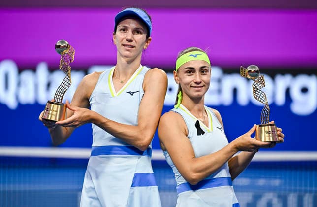 February 14, 2026, Doha, Qatar: Anna Danilina of Kazakhstan and Aleksandra Krunic of Serbia pose with their trophies after winning their Women s Doubles Final match against Su-Wei Hsieh of Chinese Taipei and Jelena Ostapenko of Latvia during the WTA, Tennis Damen Qatar TotalEnergies Open 2026 tennis tournament at the Khalifa International Tennis Complex. Anna Danilina Aleksandra Krunic won against Su-Wei Hsieh Jelena Ostapenko 0-6,6-4,10-8. 2026 Qatar TotalEnergies Open - Women s Doubles Final Match In Doha, Qatar - 14 Feb 2026  - ZUMAs197 20260214_aaa_s197_253 Copyright: xNoushadxVariyattiyakkalx
