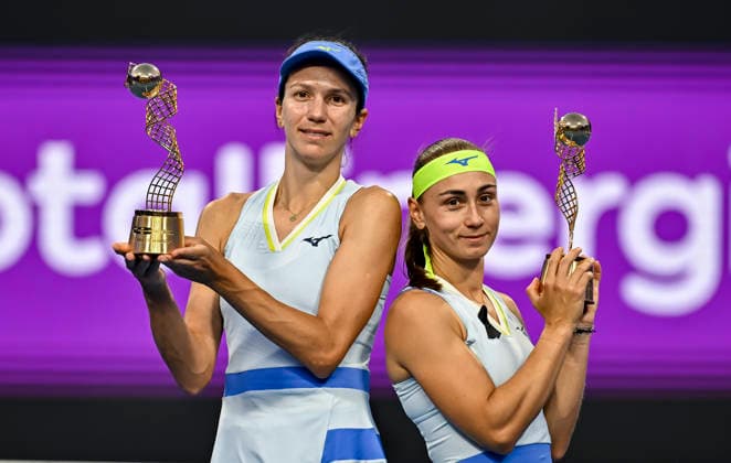 February 14, 2026, Doha, Qatar: Anna Danilina of Kazakhstan and Aleksandra Krunic of Serbia pose with their trophies after winning their Women s Doubles Final match against Su-Wei Hsieh of Chinese Taipei and Jelena Ostapenko of Latvia during the WTA, Tennis Damen Qatar TotalEnergies Open 2026 tennis tournament at the Khalifa International Tennis Complex. Anna Danilina Aleksandra Krunic won against Su-Wei Hsieh Jelena Ostapenko 0-6,6-4,10-8. Doha Qatar - ZUMAs197 20260214_aaa_s197_247 Copyright: xNoushadxVariyattiyakkalx