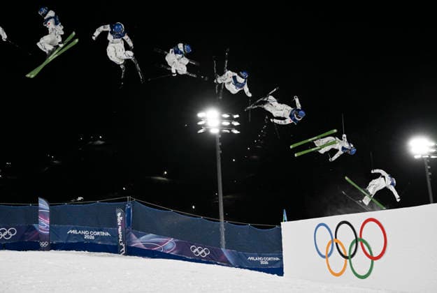 260214 -- LIVIGNO, Feb. 14, 2026 -- This multi-exposure photo shows Gu Ailing of China competing during the free skiing women s freeski big air qualification at the Milan-Cortina 2026 Olympic Winter games, Winterspiele,Spiele, Summer games in Livigno, Italy, Feb. 14, 2026. MICO2026ITALY-LIVIGNO-OLYMPIC WINTER GAMES-FREESTYLE SKIING-WOMEN S FREESKI BIG AIR-QUALIFICATION XiaxYifang  (MICO2026)ITALY-LIVIGNO-OLYMPIC WINTER GAMES-FREESTYLE SKIING-WOMEN S FREESKI BIG AIR-QUALIFICATION IMAGO XiaxYifang  imago images 0847599006