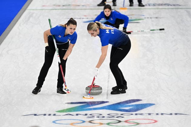 (260215) -- CORTINA D AMPEZZO, Feb. 15, 2026 -- Giulia Zardini Lacedelli (L) and Elena Mathis (R) of Italy compete during the curling women round robin session 5 match between Sweden and Italy at the 2026 Milan-Cortina Winter Olympics in Cortina, Italy, Feb. 14, 2026. ) (MICO2026)ITALY-CORTINA D AMPEZZO-OLYMPIC Winter games, Winterspiele,Spiele, Summer games CURLING-WOMEN-ROUND ROBIN LianxYi 