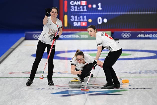 (260215) -- CORTINA D AMPEZZO, Feb. 15, 2026 -- Alina Paetz (C) of Switzerland competes during the curling women round robin session 5 match between Switzerland and Canada at the 2026 Milan-Cortina Winter Olympics in Cortina, Italy, Feb. 14, 2026. ) (MICO2026)ITALY-CORTINA D AMPEZZO-OLYMPIC Winter games, Winterspiele,Spiele, Summer games CURLING-WOMEN-ROUND ROBIN LianxYi 