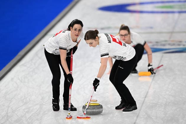 (260215) -- CORTINA D AMPEZZO, Feb. 15, 2026 -- Carole Howald (L) and Selina Witschonke of Switzerland compete during the curling women round robin session 5 match between Switzerland and Canada at the 2026 Milan-Cortina Winter Olympics in Cortina, Italy, Feb. 14, 2026. ) (MICO2026)ITALY-CORTINA D AMPEZZO-OLYMPIC Winter games, Winterspiele,Spiele, Summer games CURLING-WOMEN-ROUND ROBIN LianxYi 