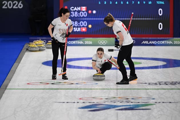 (260215) -- CORTINA D AMPEZZO, Feb. 15, 2026 -- Selina Witschonke (C) of Switzerland competes during the curling women round robin session 5 match between Switzerland and Canada at the 2026 Milan-Cortina Winter Olympics in Cortina, Italy, Feb. 14, 2026. ) (MICO2026)ITALY-CORTINA D AMPEZZO-OLYMPIC Winter games, Winterspiele,Spiele, Summer games CURLING-WOMEN-ROUND ROBIN LianxYi 