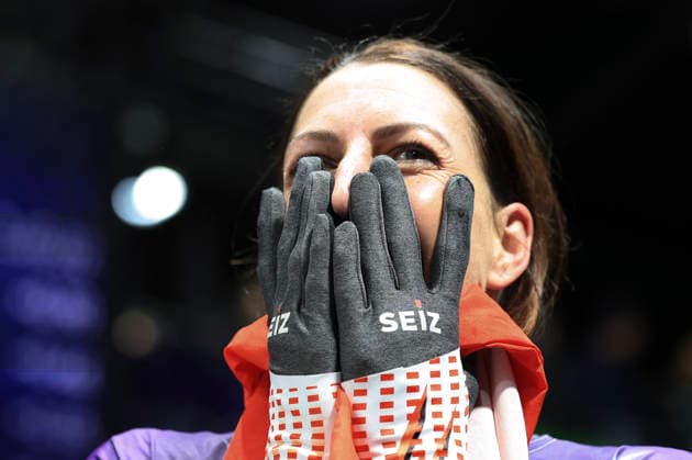 (260215) -- CORTINA D AMPEZZO, Feb. 15, 2026 -- Janine Flock of Austria reacts after the skeleton women s heat at the Milan-Cortina 2026 Olympic Winter games, Winterspiele,Spiele, Summer games in Cortina, Italy, Feb. 14, 2026. ) (MICO2026)ITALY-CORTINA D AMPEZZO-OLYMPIC WINTER GAMES-SKELETON-WOMEN DingxXu 
