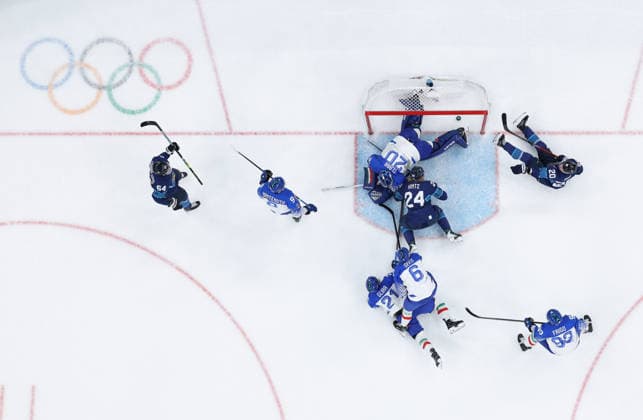 (260215) -- MILAN, Feb. 15, 2026 -- Mikael Granlund (1st L) of Finland scores during the Ice hockey, Eishockey men s preliminary round group B match between Italy and Finland of the Milan-Cortina 2026 Olympic Winter games, Winterspiele,Spiele, Summer games in Milan, Italy, Feb. 14, 2026. ) (MICO2026)ITALY-MILAN-OLYMPIC WINTER GAMES-ICE HOCKEY-MEN-PRELIMINARY-FIN VS ITA TaoxXiyi 