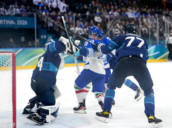 (260215) -- MILAN, Feb. 15, 2026 -- Marco Zanetti (C) of Italy vies with Juuse Saros (L), goalkeeper of Finland, during the Ice hockey, Eishockey men s preliminary round group B match between Italy and Finland of the Milan-Cortina 2026 Olympic Winter games, Winterspiele,Spiele, Summer games in Milan, Italy, Feb. 14, 2026. ) (MICO2026)ITALY-MILAN-OLYMPIC WINTER GAMES-ICE HOCKEY-MEN-PRELIMINARY-FIN VS ITA TaoxXiyi 