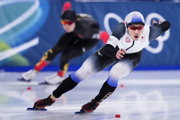 Milan Cortina Olympics: Speed skating, Eisschnelllauf Japanese speed skater Katsuhiro Kuratsubo (R) competes in the men s 500 meters at the Milan Cortina Olympics on Feb. 14, 2026, at Milano Speed Skating Stadium in Milan.  A14AA0005286378P