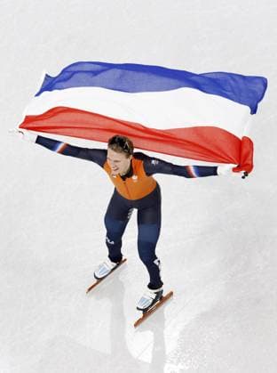 Milan Cortina Olympics: Short track Speed skating, Eisschnelllauf Jens van t Wout of the Netherlands celebrates after winning gold in the men s 1,500-meter short track speed skating event at the Milan Cortina Olympics on Feb. 14, 2026, at Milano Ice Skating Arena in Milan.  A14AA0005286834P