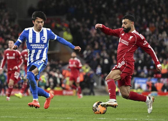 Football: FA Cup Kaoru Mitoma (L) of Brighton plays in an FA Cup fourth-round match against Liverpool at Anfield in Liverpool, England, on Feb. 14, 2026.  A14AA0005286839P