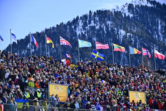 ANTERSELVA, ITALY 20260215 Audience and flags ahead of the men s 12.5 km pursuit start in biathlon in Anterselva during the Winter Olympics in Milan Cortina, Italy. *** The image is included in the SPORTS PACKAGE. For others PAYMENT IMAGE ** ANTERSELVA ITALY x10030x *** ANTERSELVA, ITALY 20260215 Audience and flags ahead of the men s 12 5 km pursuit start in biathlon in Anterselva during the Winter Olympics in Milan Cortina, Italy The image is included in the SPORTS PACKAGE For others PAYMENT IMAGE ANTERSELVA ITALY x10030x  Copyright: xJonasxEkströmer TTx 2026 OLYMPICS BIENBALL SHOOT MEN S PURSUE START