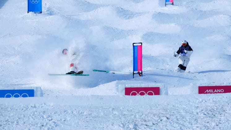 February 15, 2026, Livigno, Italy: Canada s Julien Viel, left, crashes during the men s dual moguls 1 8 final as he competes against Japan s Takuya Shimakawa at the Milano Cortina 2026 Winter Olympic Games, Olympische Spiele, Olympia, OS in Livigno, Italy on Sunday, Feb. 15, 2026. Canada News - February 15, 2026  - ZUMAc35_ 20260215_zaf_c35_004 Copyright: xSeanxKilpatrickx