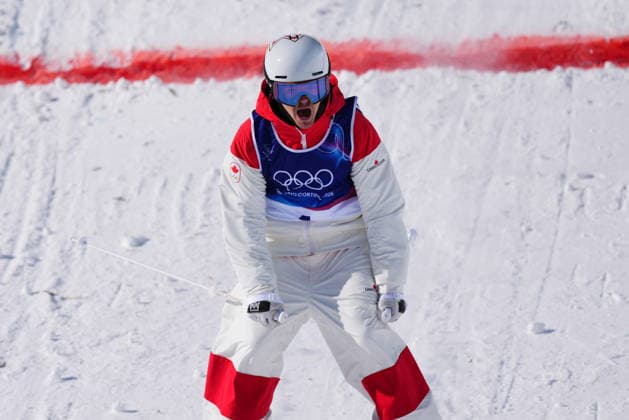 February 15, 2026, Livigno, Italy: Canada s Mikael Kingsbury reacts as he crosses into the finish zone during the men s dual moguls semi-final at the Milano Cortina 2026 Winter Olympic Games, Olympische Spiele, Olympia, OS in Livigno, Italy on Sunday, Feb. 15, 2026. Canada News - February 15, 2026  - ZUMAc35_ 20260215_zaf_c35_012 Copyright: xSeanxKilpatrickx