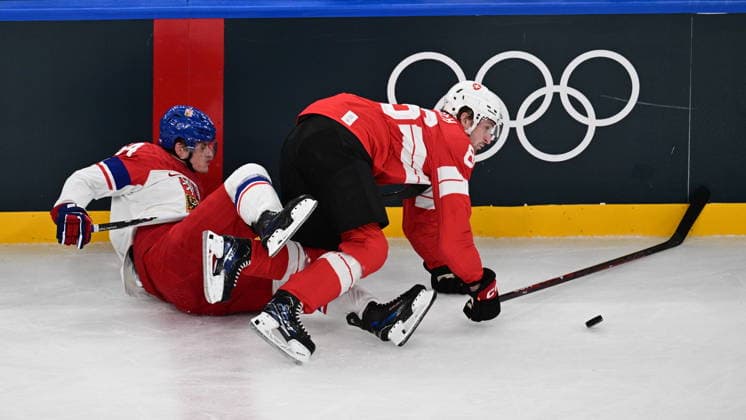 XXV Winter Olympic Games, Olympische Spiele, Olympia, OS in Milan, Italy, on February 15, 2026. Men s Ice hockey, Eishockey Group A, Switzerland vs Czech Republic. From left: David Kampf (CZE) and Janis Moser (SUI). (CTKxPhoto MichalxKamaryt) CTKPhotoP2026021502827  CTKPhotoP2026021502827