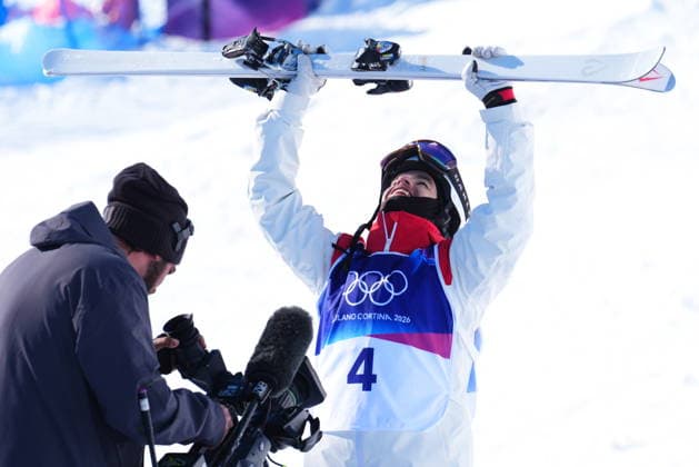 February 15, 2026, Livigno, Italy: Canada s Mikael Kingsbury (4) reacts after competing during the men s freestyle skiing dual moguls finals at the 2026 Winter Olympics, in Livigno, Italy, Sunday, Feb. 15, 2026. Canada News - February 15, 2026  - ZUMAc35_ 20260215_zaf_c35_019 Copyright: xSeanxKilpatrickx