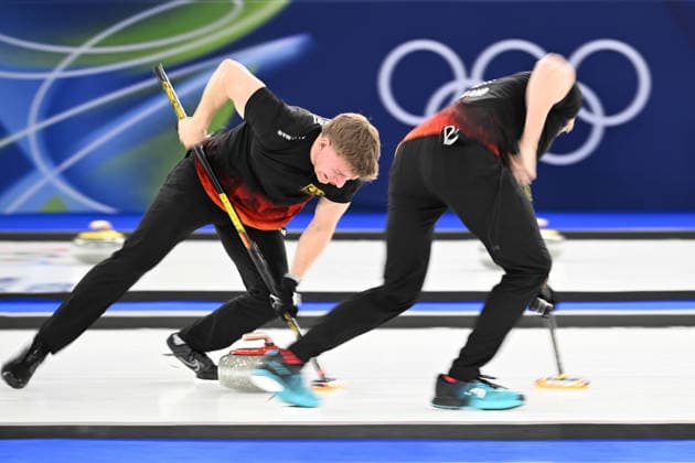 (260215) -- CORTINA D AMPEZZO, Feb. 15, 2026 -- Johannes Scheuerl (L) of Germany competes during the curling men round robin session 6 match between Germany and Britain at the 2026 Milan-Cortina Winter Olympics in Cortina, Italy, Feb. 15, 2026. ) (MICO2026)ITALY-CORTINA D AMPEZZO-OLYMPIC Winter games, Winterspiele,Spiele, Summer games CURLING-MEN-ROUND ROBIN-GER VS GBR LianxYi 