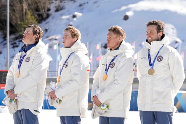 Winter Olympics in Milan Cortina 2026 Val di Fiemme, Italy 20260215. Emil Iversen, Martin Lowstrom Nyenget, Einar Hedegart and Johannes Hosflot Klaebo from Norway on the podium after the men s cross-country 4 x 7.5 km relay at Tesero CC-Stadium during the Winter Olympics in Milan Cortina 2026. Photo: Terje Pedersen NTB Val di Fiemme Italy EDITORIAL USE ONLY. RESTRICTED USE FOR BETTING COMPANIES Ref:_SPOpmvLqKCluKg.jpg *** Winter Olympics in Milan Cortina 2026 Val di Fiemme, Italy 20260215 Emil Iversen, Martin Lowstrom Nyenget, Einar Hedegart and Johannes Hosflot Klaebo from Norway on the podium after the men s cross country 4 x 7 5 km relay at Tesero CC Stadium during the Winter Olympics in Milan Cortina 2026 Photo Terje Pedersen NTB Val di Fiemme Italy EDITORIAL USE ONLY RESTRICTED USE FOR BETTING COMPANIES  Copyright: xTerjexPedersenx xNTBx