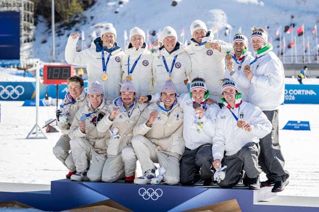 260215 Federico Pellegrino, Martino Carollo, Elia Barp and Davide Graz of Italy, Emil Iversen, Martin Lowstrom Nyenget, Einar Hedegart and Johannes Hosflot Klaebo of Norway and Theo Schely, Hugo Lapalus, Mathis Desloges, Victor Lovera and Victor Lovera of France celebrate on the podium after the men s 4 x 7.5km relay cross-country skiing race during day 9 of the 2026 Winter Olympics on February 15, 2026 in Val di Fiemme. Photo: Maxim Thore BILDBYRAN kod MT MT0983 skidor cross-country skiing langrenn Olympic Games, Olympische Spiele, Olympia, OS olympics winter olympics os ol olympiska spel vinter-os olympiske leker milano cortina 2026 milan cortina 2026 milano cortina 2026 olympic games milano cortina 2026 winter olympic games milano cortina-os milano cortina-ol vinter-ol 9 bbeng herr stafett italien jubel frankrike norge *** 260215 Federico Pellegrino, Martino Carollo, Elia Barp and Davide Graz of Italy, Emil Iversen, Martin Lowstrom Nyenget, Einar Hedegart and Johannes Hosflot Klaebo of Norway and Theo Schely, Hugo Lapalus, Mathis Desloges, Victor Lovera and Victor Lovera of France celebrate on the podium after the men s 4 x 7 5km relay cross country skiing race during day 9 of the 2026 Winter Olympics on February 15, 2026 in Val di Fiemme Photo Maxim Thore BILDBYRAN code MT MT0983 skiing cross country skiing cross country olympic games olympics winter olympics os ol olympic games winter os olympic games milano cortina 2026 milan cortina 2026 milano cortina 2026 olympic games milano cortina 2026 winter olympic games milano cortina os milano cortina ol winter ol 9 bbeng mens relay italy cheer france norway  Copyright: MAXIMxTHORE BB260215MT090