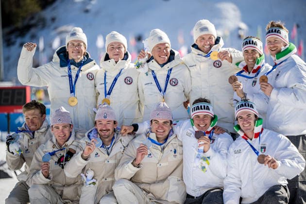 260215 Federico Pellegrino, Martino Carollo, Elia Barp and Davide Graz of Italy, Emil Iversen, Martin Lowstrom Nyenget, Einar Hedegart and Johannes Hosflot Klaebo of Norway and Theo Schely, Hugo Lapalus, Mathis Desloges, Victor Lovera and Victor Lovera of France celebrate on the podium after the men s 4 x 7.5km relay cross-country skiing race during day 9 of the 2026 Winter Olympics on February 15, 2026 in Val di Fiemme. Photo: Maxim Thore BILDBYRAN kod MT MT0983 skidor cross-country skiing langrenn Olympic Games, Olympische Spiele, Olympia, OS olympics winter olympics os ol olympiska spel vinter-os olympiske leker milano cortina 2026 milan cortina 2026 milano cortina 2026 olympic games milano cortina 2026 winter olympic games milano cortina-os milano cortina-ol vinter-ol 9 bbeng herr stafett italien jubel frankrike norge *** 260215 Federico Pellegrino, Martino Carollo, Elia Barp and Davide Graz of Italy, Emil Iversen, Martin Lowstrom Nyenget, Einar Hedegart and Johannes Hosflot Klaebo of Norway and Theo Schely, Hugo Lapalus, Mathis Desloges, Victor Lovera and Victor Lovera of France celebrate on the podium after the men s 4 x 7 5km relay cross country skiing race during day 9 of the 2026 Winter Olympics on February 15, 2026 in Val di Fiemme Photo Maxim Thore BILDBYRAN code MT MT0983 skiing cross country skiing cross country olympic games olympics winter olympics os ol olympic games winter os olympic games milano cortina 2026 milan cortina 2026 milano cortina 2026 olympic games milano cortina 2026 winter olympic games milano cortina os milano cortina ol winter ol 9 bbeng mens relay italy cheer france norway  Copyright: MAXIMxTHORE BB260215MT091
