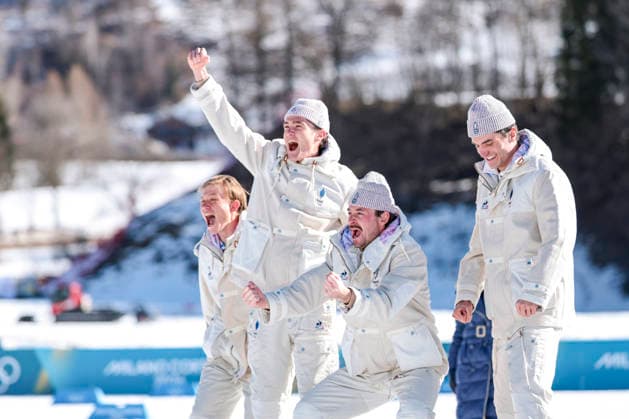 OLYMPICS - Winter Olympic Games, Olympische Spiele, Olympia, OS Milano Cortina 2026 TESERO,ITALY,15.FEB.26 - OLYMPICS, NORDIC SKIING, CROSS COUNTRY SKIING - Winter Olympic Games Milano Cortina 2026, 4X7.5km relay, men, medal ceremony. Image shows the rejoicing of Victor Lovera, Mathis Desloges, Hugo Lapalus and Theo Schely (FRA)..  GEPAxpictures xMatthiasxTrinkl
