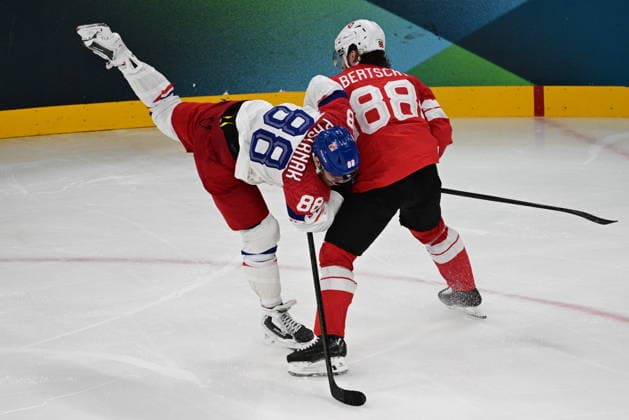 XXV Winter Olympic Games, Olympische Spiele, Olympia, OS in Milan, Italy, on February 15, 2026. Men s Ice hockey, Eishockey Group A, Switzerland vs Czech Republic. From left: David Pastrnak (CZE) and Christoph Bertschy (CZE). (CTKxPhoto MichalxKamaryt) CTKPhotoP2026021503927  CTKPhotoP2026021503927
