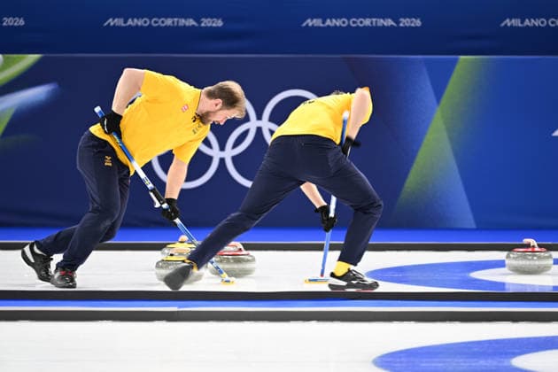 (260215) -- CORTINA D AMPEZZO, Feb. 15, 2026 -- Rasmus Wranaa (L) of Sweden competes during the curling men round robin session 6 match between the United States and Sweden at the 2026 Milan-Cortina Winter Olympics in Cortina, Italy, Feb. 15, 2026. ) (MICO2026)ITALY-CORTINA D AMPEZZO-OLYMPIC Winter games, Winterspiele,Spiele, Summer games CURLING-MEN-ROUND ROBIN-USA VS SWE LianxYi 