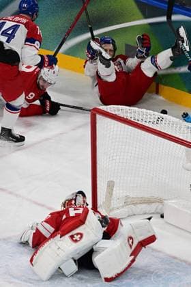 XXV Winter Olympic Games, Olympische Spiele, Olympia, OS in Milan, Italy, on February 15, 2026. Men s Ice hockey, Eishockey Group A, Switzerland vs Czech Republic. Radim Simek (CZE), up right, celebrates a goal. From left: Filip Chlapik (CZE), Damiaen Riat (SUI) and goalkeeper Leonardo Genoni (SUI). (CTKxPhoto MichalxKamaryt) CTKPhotoP2026021504017  CTKPhotoP2026021504017