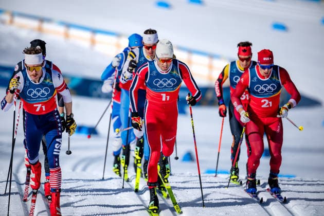 OLYMPICS - Winter Olympic Games, Olympische Spiele, Olympia, OS Milano Cortina 2026 TESERO,ITALY,15.FEB.26 - OLYMPICS, NORDIC SKIING, CROSS COUNTRY SKIING - Winter Olympic Games Milano Cortina 2026, 4X7.5km relay, men. Image shows Ben Ogden (USA), Emil Iversen (NOR) and Valerio Grond (SUI).  GEPAxpictures xMatthiasxTrinkl