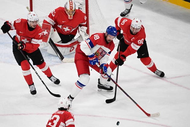 XXV Winter Olympic Games, Olympische Spiele, Olympia, OS in Milan, Italy, on February 15, 2026. Men s Ice hockey, Eishockey Group A, Switzerland vs Czech Republic. From left: Calvin Thurkauf (SUI), goalkeeper Leonardo Genoni (SUI), Tomas Hertl (CZE), Roman Josi (SUI) and Nico Hischier (SUI). (CTKxPhoto MichalxKamaryt) CTKPhotoP2026021504589  CTKPhotoP2026021504589