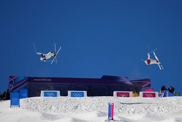 (260215) -- LIVIGNO, Feb. 15, 2026 -- Mikael Kingsbury (R) of Canada and Horishima Ikuma of Japan compete during the freestyle skiing men s dual moguls big final at the Milan-Cortina 2026 Olympic Winter games, Winterspiele,Spiele, Summer games in Livigno, Italy, Feb. 15, 2026. ) (MICO2026)ITALY-LIVIGNO-OLYMPIC WINTER GAMES-FREESTYLE SKIING-MEN S DUAL MOGULS-FINALS WuxHuiwo 