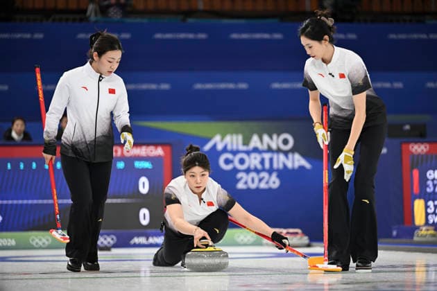 (260215) -- CORTINA D AMPEZZO, Feb. 15, 2026 -- Dong Ziqi (C) of China competes during the curling women round robin session 6 match between China and the United States at the 2026 Milan-Cortina Winter Olympics in Cortina, Italy, Feb. 15, 2026. ) (MICO2026)ITALY-CORTINA D AMPEZZO-OLYMPIC Winter games, Winterspiele,Spiele, Summer games CURLING-WOMEN-ROUND ROBIN LianxYi 