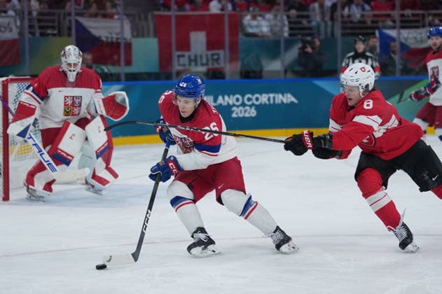 (260215) -- MILAN, Feb. 15, 2026 -- Jiri Tichacek (C) of the Czech Republic and Simon Knak (R) of Switzerland battle for the puck during the Ice hockey, Eishockey men s preliminary round group A match between Switzerland and the Czech Republic of the Milan-Cortina 2026 Olympic Winter games, Winterspiele,Spiele, Summer games in Milan, Italy, Feb. 15, 2026. ) (MICO2026)ITALY-MILAN-OLYMPIC WINTER GAMES-ICE HOCKEY-MEN-PRELIMINARY-SUI VS CZE TaoxXiyi 
