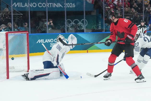 February 15, 2026, Milan, Italy: MARK STONE of Canada scores a short-handed goal against Julian Junca (33) of France during first period of game during the 2026 Milan Cortina Winter Olympics. Olympics 2026: Milano Cortina: Ice hockey, Eishockey Men s CAN:FRA  - ZUMAc35_ 20260215_zaf_c35_083 Copyright: xNathanxDenettex
