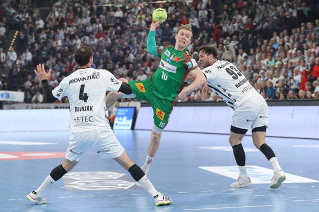 15.02.2026, xgox, Handball - Daikin HBL THW Kiel - SC Magdeburg emspor, v.l. Domagoj Duvnjak (Kiel, 4), Gisli Thorgeir Kristjansson (Magdeburg, 10), Veron Nacinovic (Kiel, 93) Zweikampf, Duell, Kampf, tackle Kiel