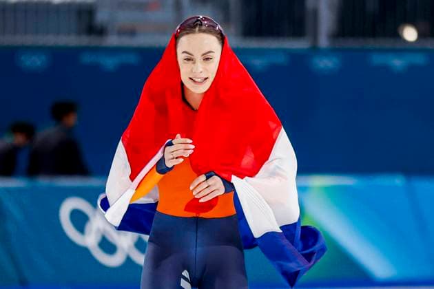 winner Femke Kok of the Netherlands celebrating and holding flag after Women s 500m, Milano Cortina 2026 Winter Olympics: Day 9, Speed skating, Eisschnelllauf - Milano Cortina 2026 Winter Olympics: Day 9, Milano Speed Skating Stadium, February 15, 2026, Milan, Italy.