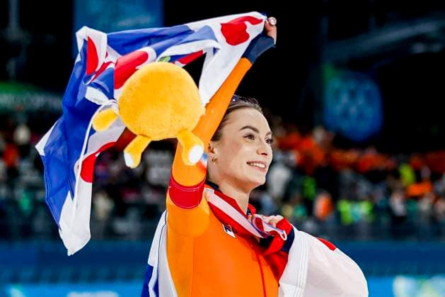 winner Femke Kok of the Netherlands celebrating and holding flag after Women s 500m, Milano Cortina 2026 Winter Olympics: Day 9, Speed skating, Eisschnelllauf - Milano Cortina 2026 Winter Olympics: Day 9, Milano Speed Skating Stadium, February 15, 2026, Milan, Italy.