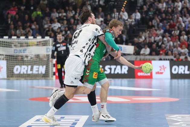 15.02.2026, xgox, Handball - Daikin HBL THW Kiel - SC Magdeburg emspor, v.l. Veron Nacinovic (Kiel, 93), Gisli Thorgeir Kristjansson (Magdeburg, 10) Zweikampf, Duell, Kampf, tackle Kiel