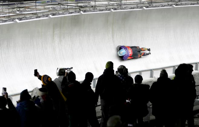 (260215) -- CORTINA D AMPEZZO, Feb. 15, 2026 -- Zhao Dan of China competes during the skeleton mixed team event at the Milan-Cortina 2026 Olympic Winter games, Winterspiele,Spiele, Summer games in Cortina, Italy, Feb. 15, 2026. ) (MICO2026)ITALY-CORTINA D AMPEZZO-OLYMPIC WINTER GAMES-SKELETON MIXED TEAM LixGang 