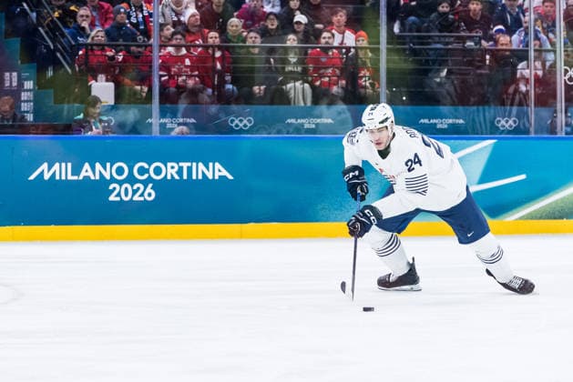 MILANO, ITALY - FEBRUARY 15: Justin Addamo (France, 24) controls the puck during the Ice hockey, Eishockey Men Canada vs France - Preliminary Round - Group A at the Milano Cortina 2026 Olympics at Milano Santagiulia Ice Hockey Arena on day 9 of the Milano Cortina 2026 Olympics on February 15, 2026 in Milano, Italy. Editorial use only. Italy Copyright: xSteffiexWunderlx