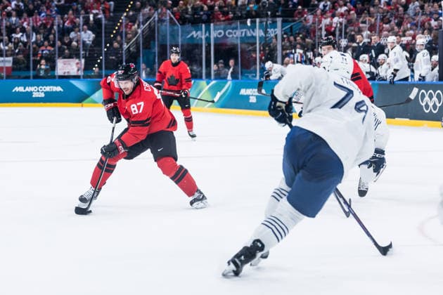 MILANO, ITALY - FEBRUARY 15: Devon Toews (Canada, 7) shoots the puck during the Ice hockey, Eishockey Men Canada vs France - Preliminary Round - Group A at the Milano Cortina 2026 Olympics at Milano Santagiulia Ice Hockey Arena on day 9 of the Milano Cortina 2026 Olympics on February 15, 2026 in Milano, Italy. Editorial use only. Italy Copyright: xSteffiexWunderlx