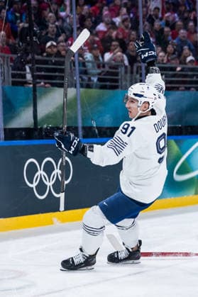 MILANO, ITALY - FEBRUARY 15: Floran Douay (France, 91) cheers after scoring the 1:1 goal during the Ice hockey, Eishockey Men Canada vs France - Preliminary Round - Group A at the Milano Cortina 2026 Olympics at Milano Santagiulia Ice Hockey Arena on day 9 of the Milano Cortina 2026 Olympics on February 15, 2026 in Milano, Italy. Editorial use only. Italy Copyright: xSteffiexWunderlx