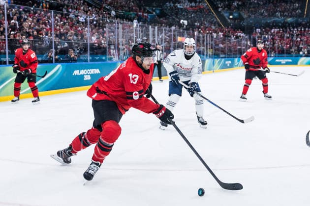 MILANO, ITALY - FEBRUARY 15: Sam Reinhart (Canada, 13) controls the puck during the Ice hockey, Eishockey Men Canada vs France - Preliminary Round - Group A at the Milano Cortina 2026 Olympics at Milano Santagiulia Ice Hockey Arena on day 9 of the Milano Cortina 2026 Olympics on February 15, 2026 in Milano, Italy. Editorial use only. Italy Copyright: xSteffiexWunderlx