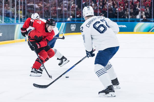MILANO, ITALY - FEBRUARY 15: Macklin Celebrini (Canada, 17) controls the puck against +f67+ during the Ice hockey, Eishockey Men Canada vs France - Preliminary Round - Group A at the Milano Cortina 2026 Olympics at Milano Santagiulia Ice Hockey Arena on day 9 of the Milano Cortina 2026 Olympics on February 15, 2026 in Milano, Italy. Editorial use only. Italy Copyright: xSteffiexWunderlx