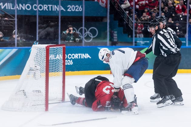 MILANO, ITALY - FEBRUARY 15: Tom Wilson (Canada, 43) and Pierre Crinon (France, 7) start a fight are fighting during the Ice hockey, Eishockey Men Canada vs France - Preliminary Round - Group A at the Milano Cortina 2026 Olympics at Milano Santagiulia Ice Hockey Arena on day 9 of the Milano Cortina 2026 Olympics on February 15, 2026 in Milano, Italy. Editorial use only. Italy Copyright: xSteffiexWunderlx